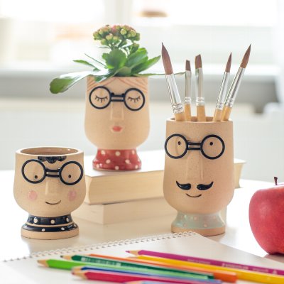 Blumentopf Herr mit Brille