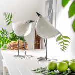 Vogel mit Blatt