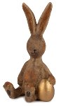 Lapin assis avec œuf